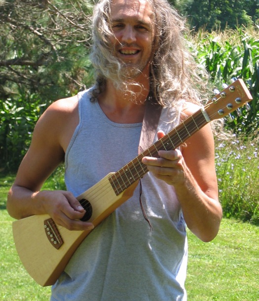 photo of Andy playing his Martin Backpacker